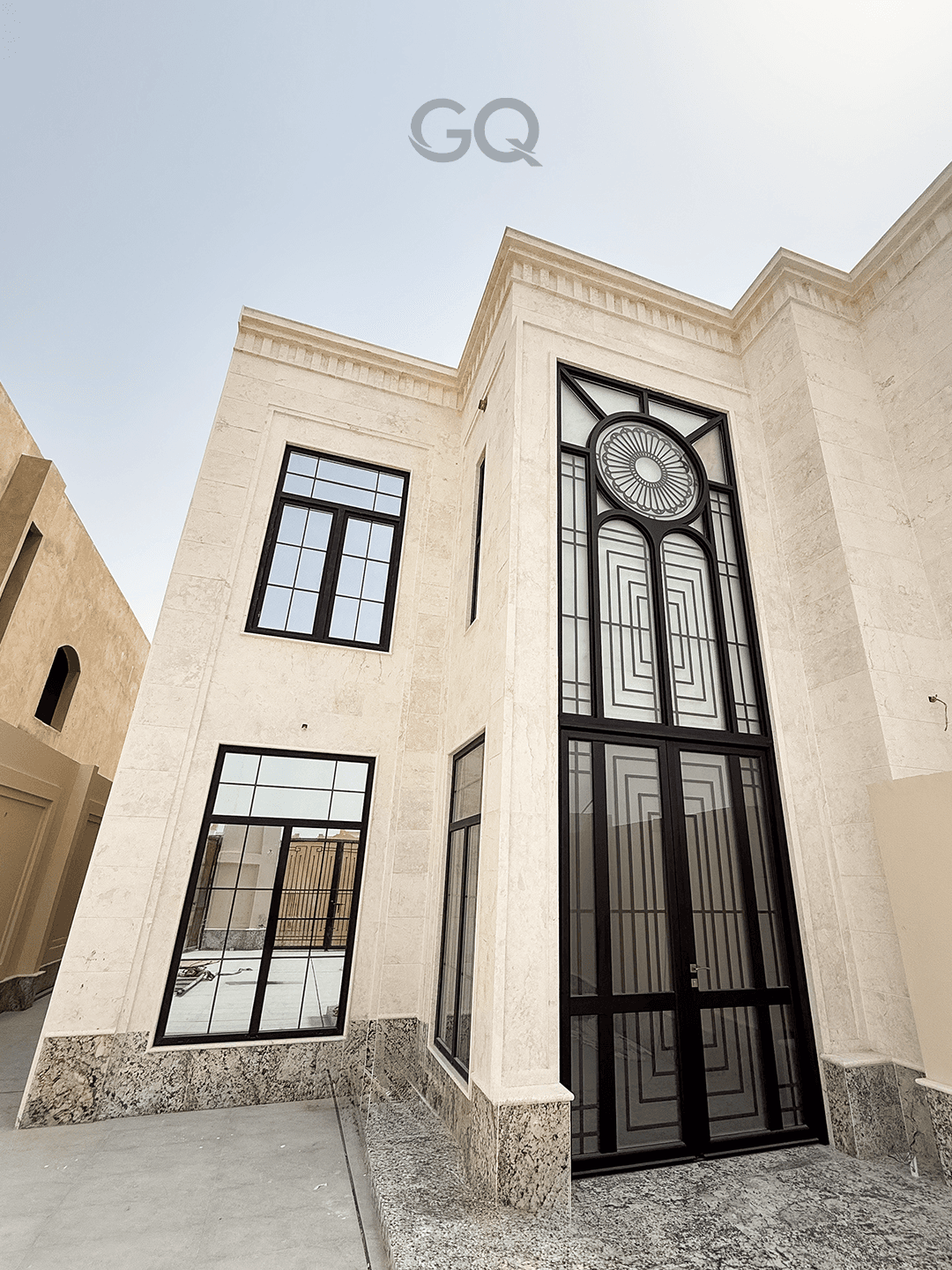 Aluminium door with geometric glass design installed by German Quality